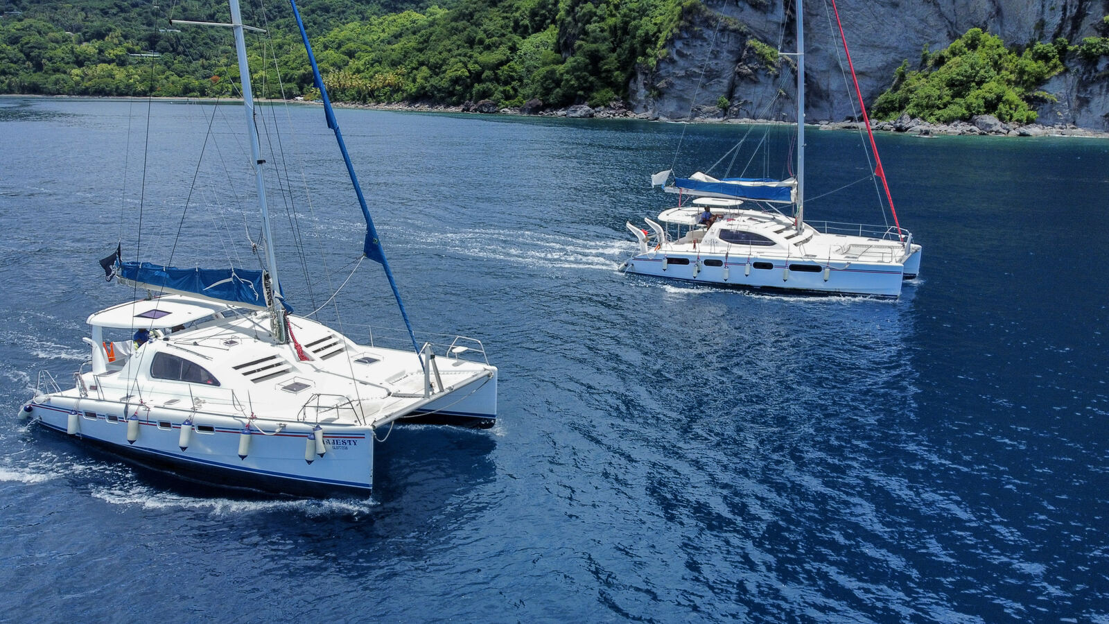 Majesty catamaran sailing past the St. Lucia coastline